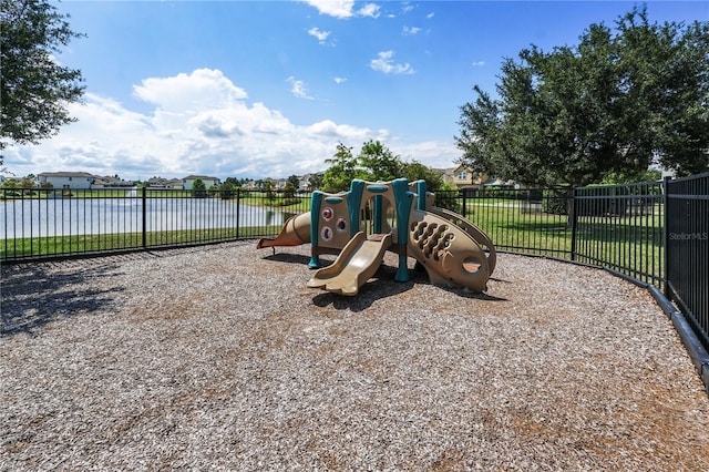 view of play area with a water view