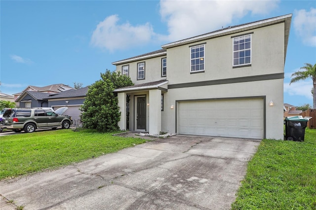 traditional-style home featuring a garage, concrete driveway, a front lawn, and stucco siding