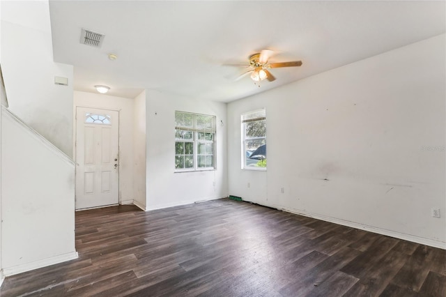 entryway with ceiling fan and wood-type flooring