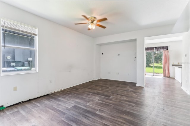 empty room featuring ceiling fan and wood finished floors