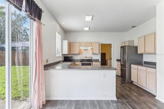 kitchen featuring light brown cabinets, stainless steel electric range oven, kitchen peninsula, and dark hardwood / wood-style flooring