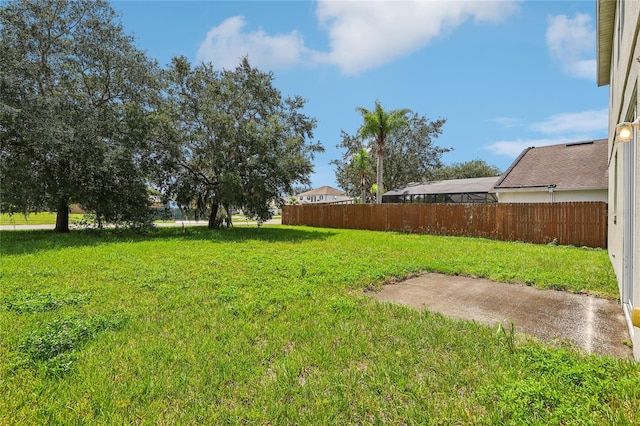 view of yard with fence