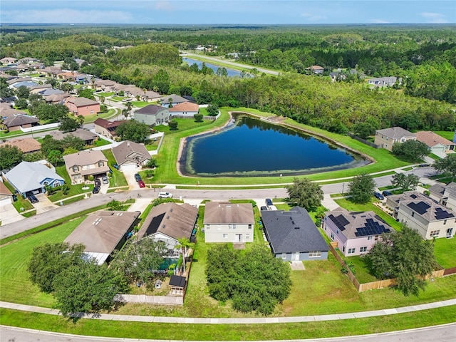 birds eye view of property featuring a water view and a residential view