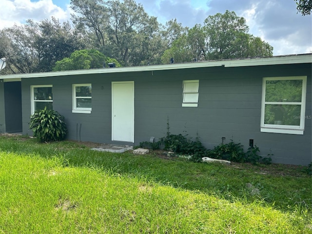 view of front of property featuring concrete block siding