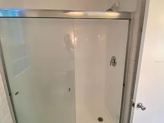 bathroom with walk in shower