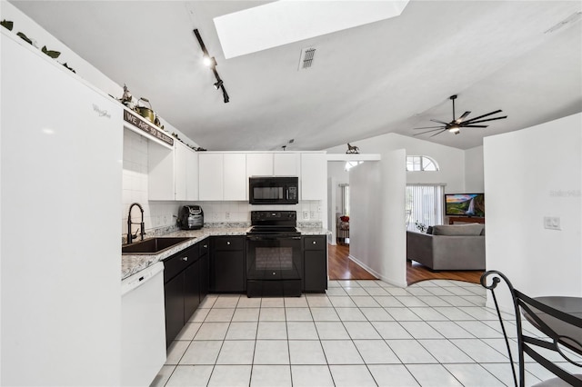 kitchen with sink, white cabinetry, light wood-type flooring, ceiling fan, and black appliances