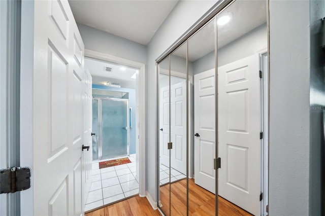 hallway featuring light hardwood / wood-style floors