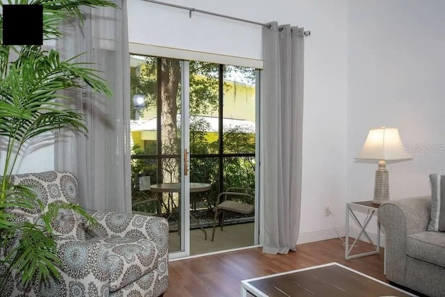 entryway with dark hardwood / wood-style floors