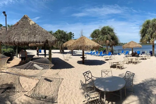 view of property's community featuring a gazebo and a water view