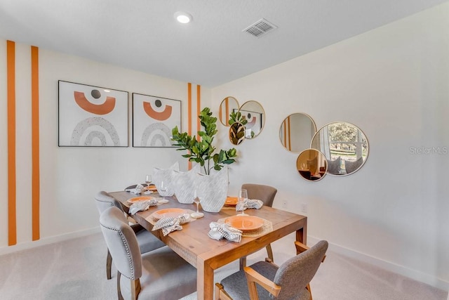 view of carpeted dining room