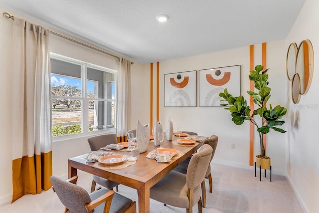 view of carpeted dining room