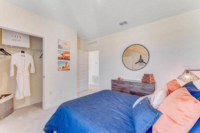 carpeted bedroom featuring a closet