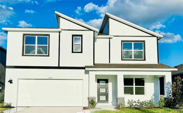 view of front of property featuring a garage