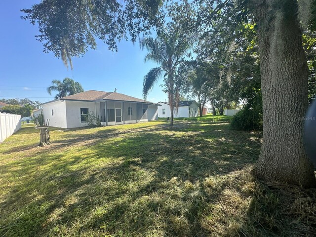 view of yard with fence