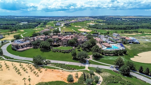 aerial view featuring view of golf course and a residential view