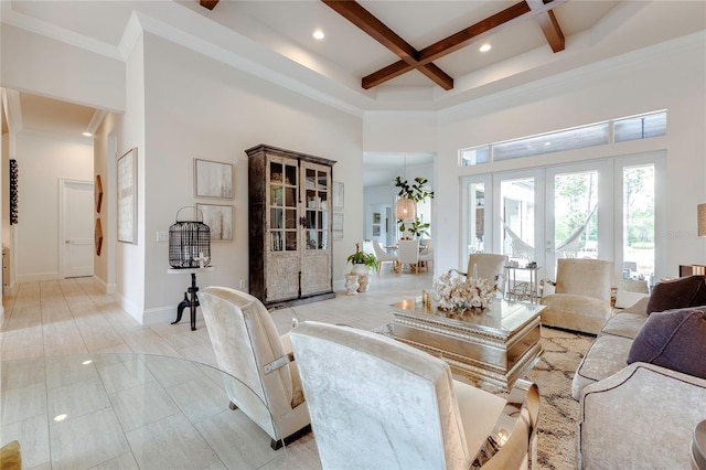 living room with a high ceiling, coffered ceiling, baseboards, french doors, and beam ceiling