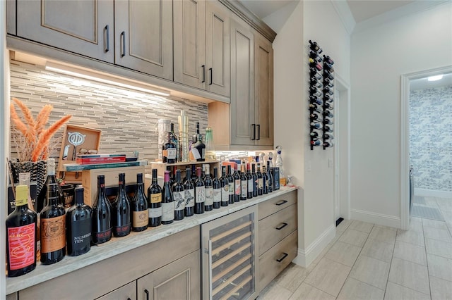 bar with wine cooler, baseboards, ornamental molding, a dry bar, and tasteful backsplash