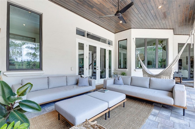 view of patio with ceiling fan, an outdoor hangout area, and french doors