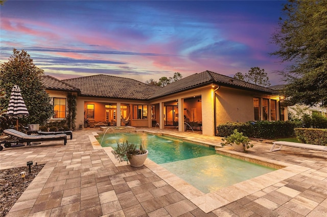 outdoor pool with a patio