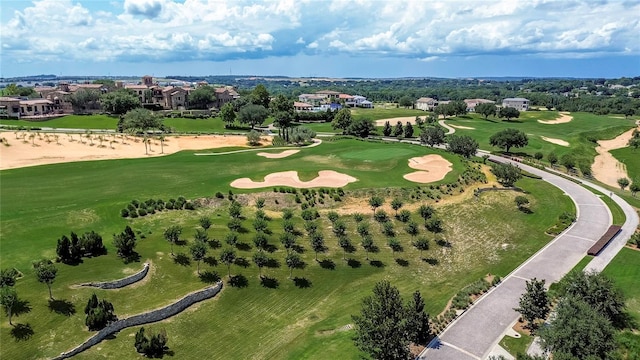 birds eye view of property featuring view of golf course