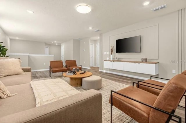 living room with hardwood / wood-style floors