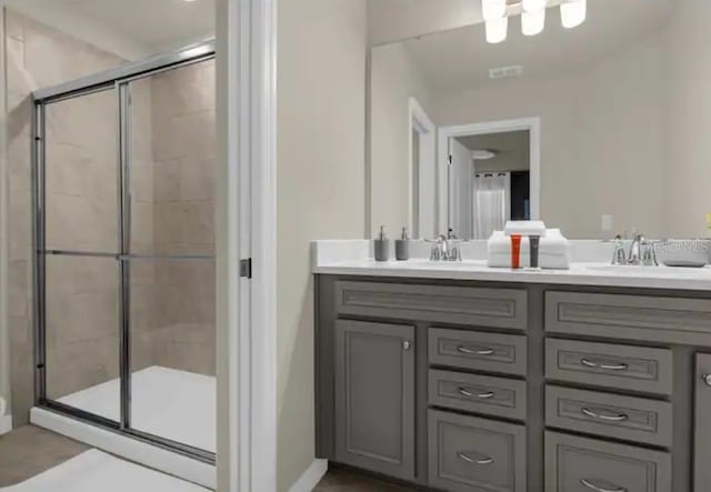 bathroom featuring vanity and walk in shower