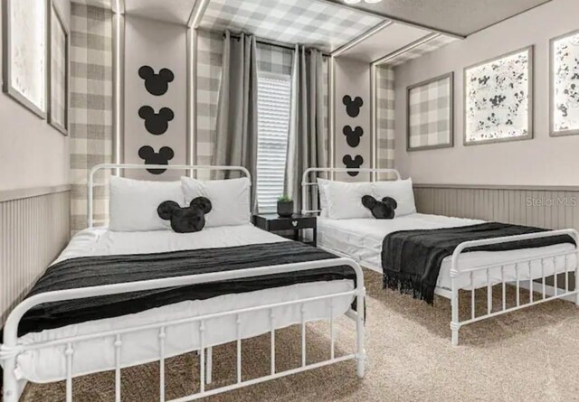 4424 Kaipo Rd, Davenport, FL 33897 - carpeted bedroom with a wainscoted wall