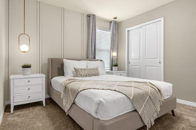 carpeted bedroom featuring a closet