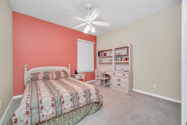 bedroom with ceiling fan and carpet flooring