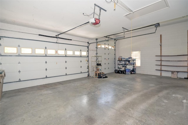 garage featuring a garage door opener