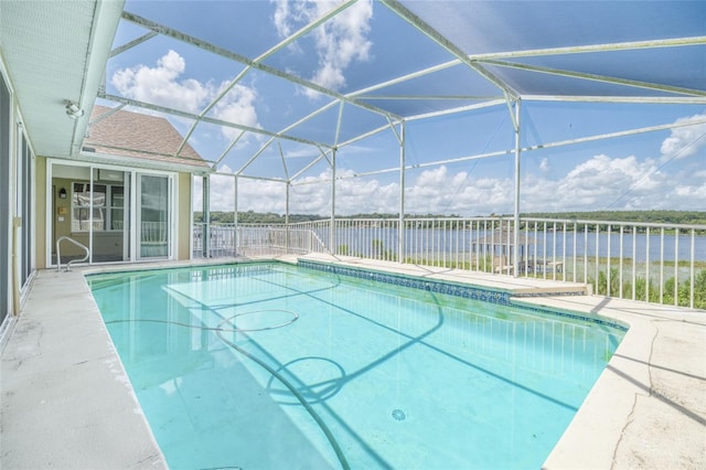 view of pool featuring a fenced in pool, glass enclosure, a water view, and fence