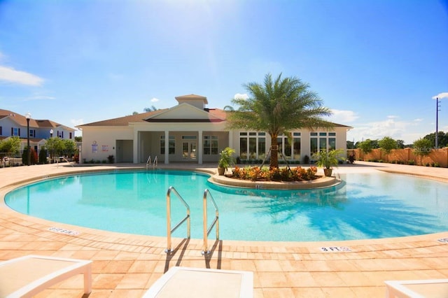 view of pool featuring a patio