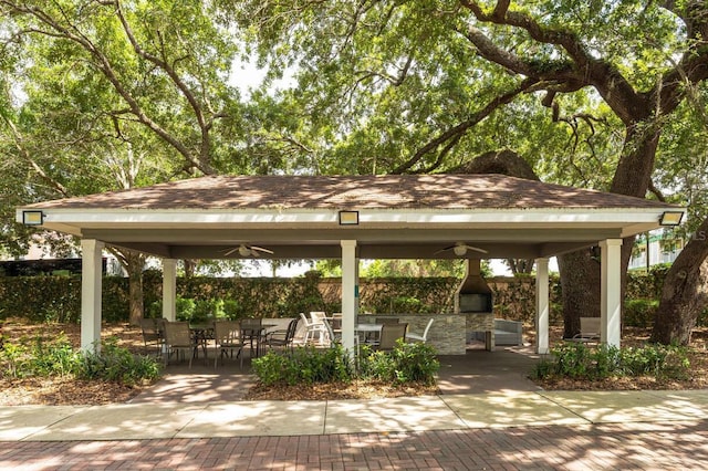 view of home's community with a gazebo and area for grilling