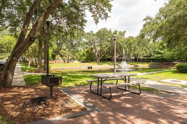 view of community featuring a yard