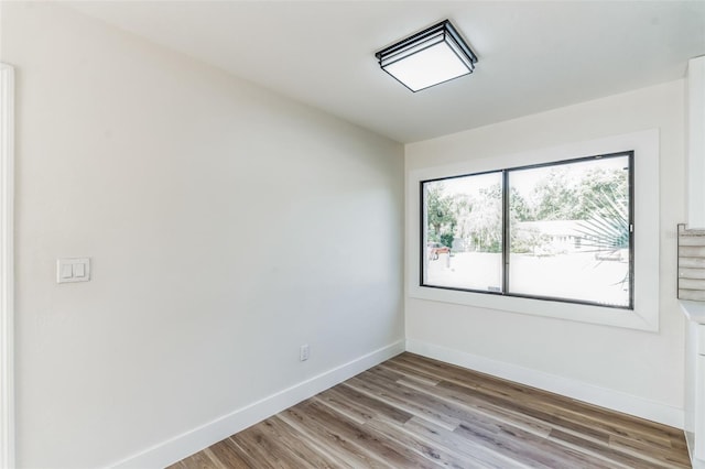 spare room featuring light wood-type flooring