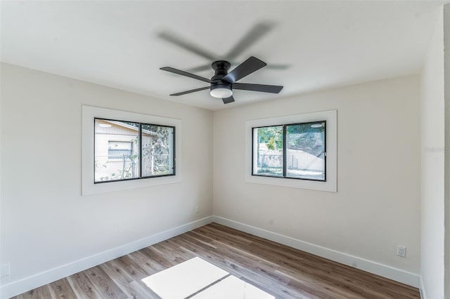 unfurnished room with ceiling fan and light hardwood / wood-style floors