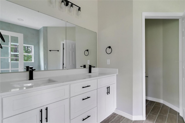 bathroom featuring double sink vanity