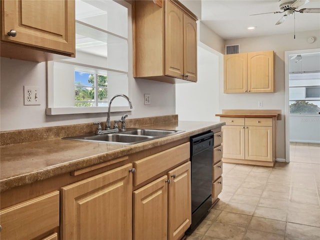 kitchen featuring black dishwasher, sink, light brown cabinets, and ceiling fan