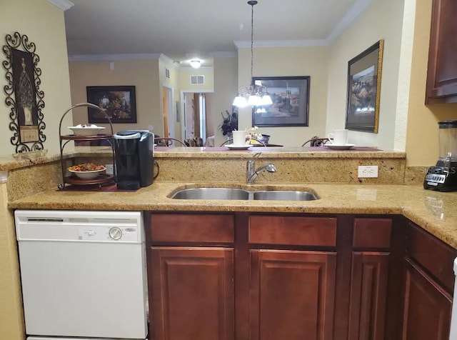 kitchen with ornamental molding, sink, light stone counters, white dishwasher, and hanging light fixtures