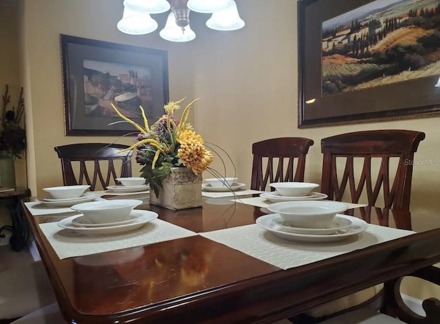 dining area with a chandelier