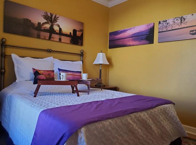 bedroom featuring ornamental molding