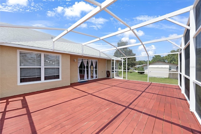 wooden deck with a lanai