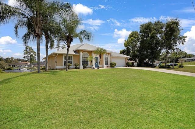 ranch-style house with a garage, concrete driveway, a front lawn, and stucco siding