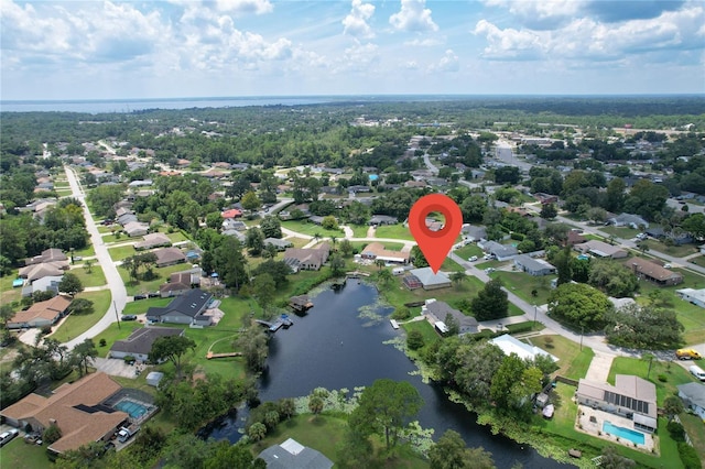 aerial view with a water view and a residential view