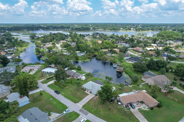 aerial view featuring a water view and a residential view