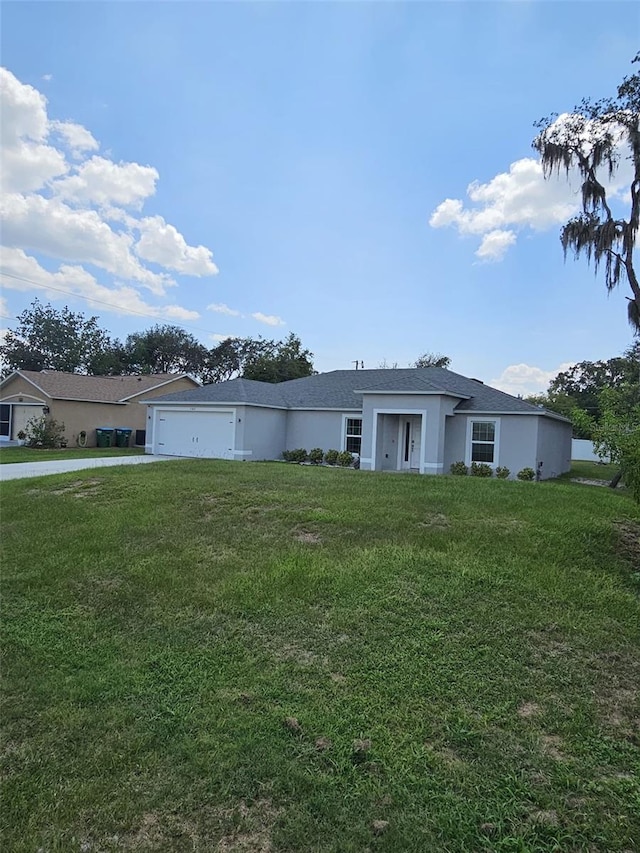 ranch-style home featuring a front yard