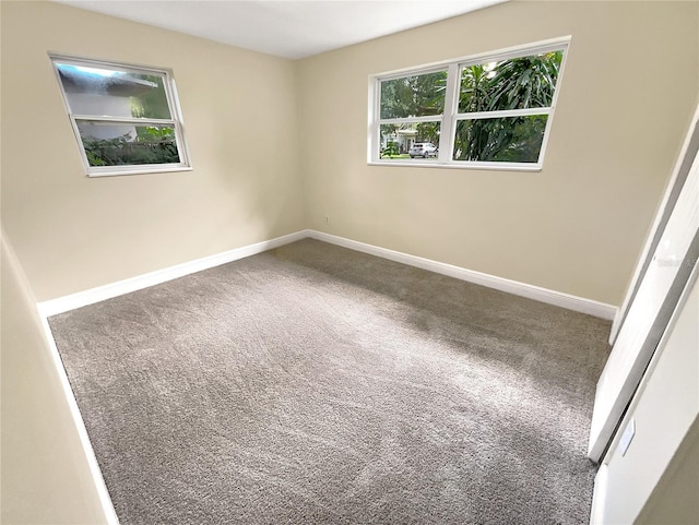 view of carpeted spare room