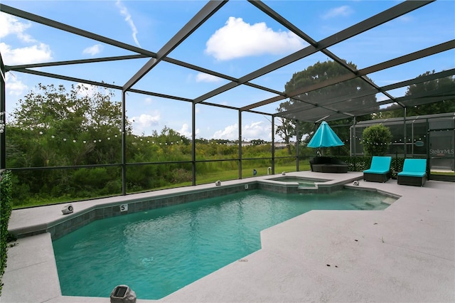 view of pool featuring an in ground hot tub, a patio, and a lanai