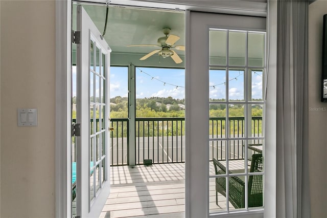 entryway with ceiling fan, light hardwood / wood-style flooring, and a healthy amount of sunlight