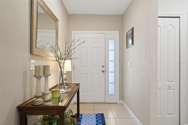 view of tiled foyer entrance